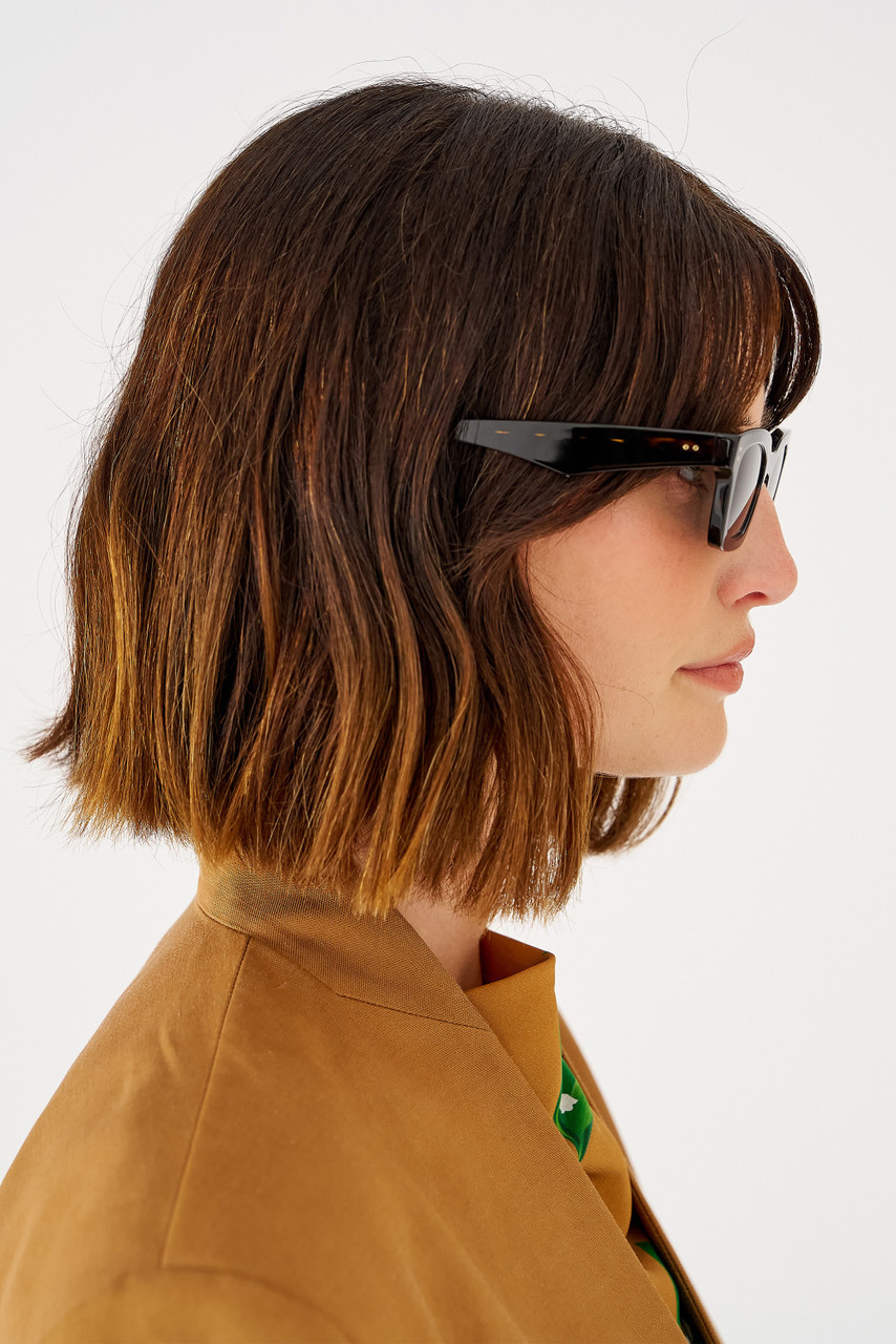 A Person with a Very Short Hair Wearing Black Framed Sunglasses · Free  Stock Photo