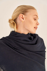 Profile view of model wearing the Oroton Anna Jacquard Wrap in Black and 72% Modal, 28% Silk for Women
