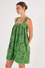 Profile view of model wearing the Oroton Lace Sun Dress in Garden and 100% Polyester for Women