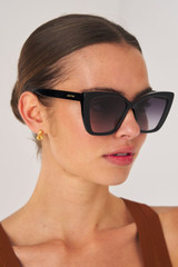 Profile view of model wearing the Oroton Jamie Sunglasses in Black and Acetate for Women