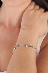 Profile view of model wearing the Oroton Keely Bracelet in Silver/Clear and  for Women