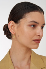 Profile view of model wearing the Oroton Fawne Circle Mini Hoops in Gold/Clear and Brass Base With 18CT Gold Plating /Cubic Zirconia for Women