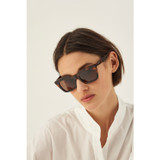 Profile view of model wearing the Oroton Astrid Sunglasses in Tort and Acetate for Women