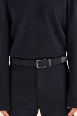 Profile view of model wearing the Oroton Hugo Woven Elastic Belt in Ink and Saffiano Leather With Woven Elastic for Men