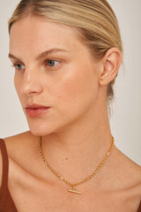 Profile view of model wearing the Oroton Inez Vintage Chain Necklace in Gold and Brass Base With 18CT Gold Plating for Women