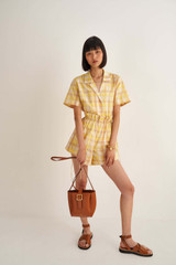 Profile view of model wearing the Oroton Check Camp Shirt in Cornsilk and 86% Cotton 14% Viscose for Women