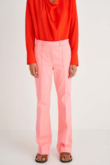 Profile view of model wearing the Oroton Drill Wide Leg Pant in Sherbet and Cotton Drill for Women