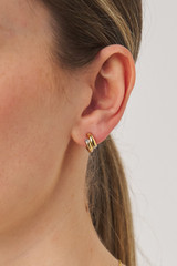 Profile view of model wearing the Oroton Giselle Necklace And Hoops Gift Set in Gold/Clear and  for Women