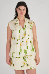 Profile view of model wearing the Oroton Field Daisy Tunic in String and 100% Silk for Women