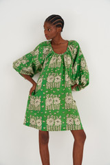 Profile view of model wearing the Oroton Full Sleeve Posie Print Dress in Garden and 100% Linen for Women
