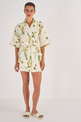 Profile view of model wearing the Oroton Field Daisy Print Robe in String and 100% Linen for Women