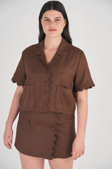 Profile view of model wearing the Oroton Cropped Scallop Camp Shirt in Dark Chocolate and 100% Linen for Women