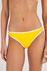 Profile view of model wearing the Oroton Contrast Separate Bottom in Vibrant Yellow and 78% Recycled Nylon/ 22 % Lycra for Women