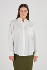 Profile view of model wearing the Oroton Poplin Long Sleeve Shirt in White and 100% Cotton for Women