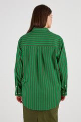 Profile view of model wearing the Oroton Stripe Shirt in Kelly Green and 100% Cotton for Women