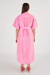 Profile view of model wearing the Oroton Silk Shirt Dress in Candy Pink and 100% Silk for Women