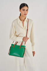 Profile view of model wearing the Oroton Harriet Mini Tote in Emerald and Saffiano Leather With Smooth Leather Trim for Women