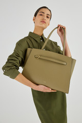 Profile view of model wearing the Oroton Audrey Large Tote in Silt and Embossed Leather With Smooth Leather Trims for Women