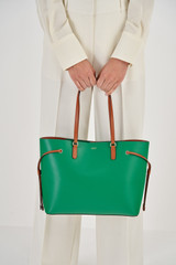 Profile view of model wearing the Oroton Harriet Medium Tote in Emerald and Saffiano Leather for Women
