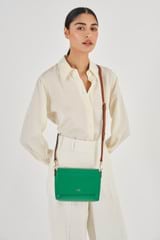 Profile view of model wearing the Oroton Harriet Crossbody in Emerald and Saffiano Leather for Women