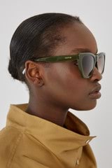 Profile view of model wearing the Oroton Sunglasses Eilian in Khaki and Acetate for Women