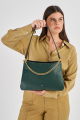 Profile view of model wearing the Oroton Asha Medium Hobo in Juniper and Pebble Leather for Women