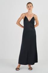 Profile view of model wearing the Oroton Diamond Detail Slip Dress in Black and 100% Silk for Women