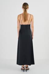 Profile view of model wearing the Oroton Diamond Detail Slip Dress in Black and 100% Silk for Women