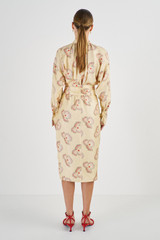 Profile view of model wearing the Oroton Spaced Floral Print Dress in Cream and 100% Silk for Women