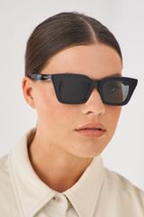 Profile view of model wearing the Oroton Sunglasses Astrid Polarised in Black and Acetate for Women