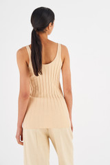Profile view of model wearing the Oroton Rib Tank in Creamed Honey and 77% Viscose 23% Polyester for Women