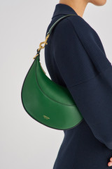 Profile view of model wearing the Oroton Florence Small Shoulder Bag in Treehouse and Smooth leather for Women