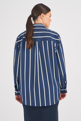 Profile view of model wearing the Oroton Long Sleeve Stripe Poplin Shirt in North Sea and 100% Cotton for Women