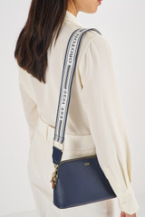 Profile view of model wearing the Oroton Heather Webbing Strap in Dark Navy/Natural and  for Women