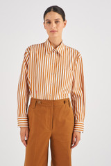 Profile view of model wearing the Oroton Long Sleeve Stripe Shirt in Treacle and 100% Cotton for Women
