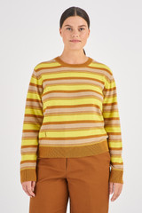 Profile view of model wearing the Oroton Merino Long Sleeve Stripe Crew Knit in Treacle and 100% Merino Wool for Women