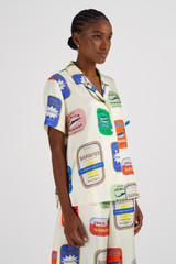 Profile view of model wearing the Oroton Sardinia Print Camp Shirt in Multi and 100% Silk for Women