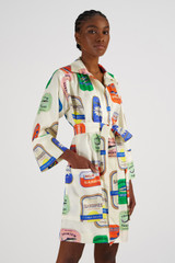 Profile view of model wearing the Oroton Sardinia Print Tunic Dress in Multi and 100% Silk for Women