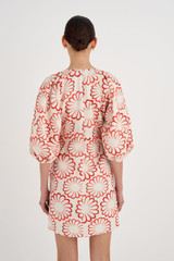 Profile view of model wearing the Oroton Dahlia Print Short Dress in Red Ribbon and 100% Linen for Women