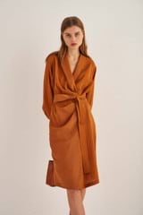 Profile view of model wearing the Oroton Robe Dress in Tan and 75% Viscose 25% Polyester for Women