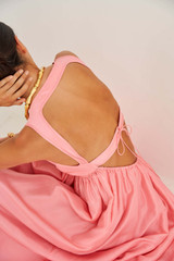 Profile view of model wearing the Oroton Strappy Sundress in Strawberry and 100% Silk for Women