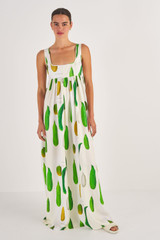 Profile view of model wearing the Oroton Summer Vegetable Print Dress in String and 100% Silk for Women