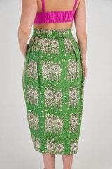 Profile view of model wearing the Oroton Posie Print Skirt in Garden and 100% Linen for Women