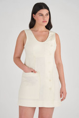 Profile view of model wearing the Oroton Button Up Mini Dress in Soft Cream and 100% Linen for Women