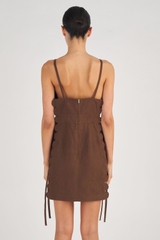 Profile view of model wearing the Oroton Mini Scallop Dress in Dark Chocolate and 100% Linen for Women