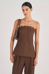 Profile view of model wearing the Oroton Scallop Bodice in Dark Chocolate and 100% Linen for Women