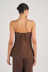 Profile view of model wearing the Oroton Scallop Bodice in Dark Chocolate and 100% Linen for Women
