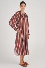 Profile view of model wearing the Oroton Long Sleeve Stripe Dress in Iced Chocolate and 100% Linen for Women