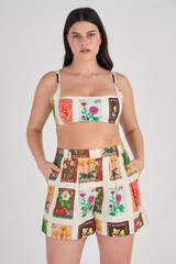 Profile view of model wearing the Oroton Flower Stamp Print Short in String and 100% Linen for Women