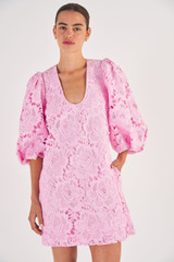 Profile view of model wearing the Oroton Short Lace Dress in Foxglove and 100% Polyester for Women